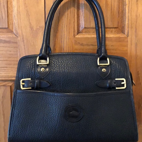 Dooney & Bourke Handbags - Dooney & Bourke Black Leather / Brass Purse
